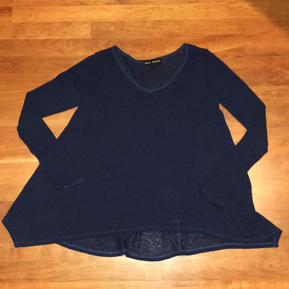 Blue sweater.